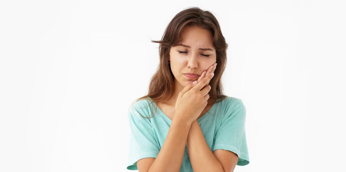 The Tug of War: Dealing with a Loose Tooth that's Still Attached in Adults