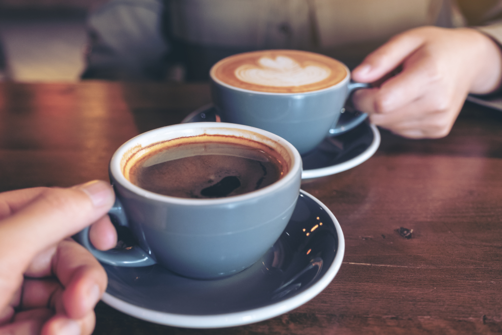 Two cups of coffee illustrating drinks you should not have while wearing Invisalign