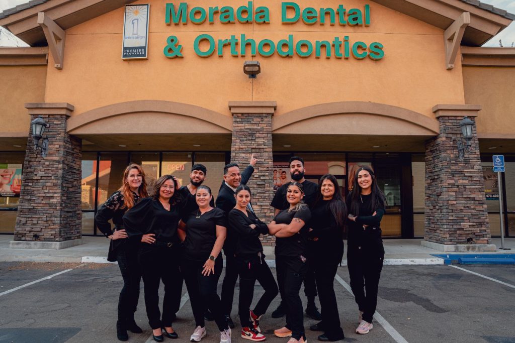 Morada Clinic staff standing in front of the dental clinic in Stockton, California